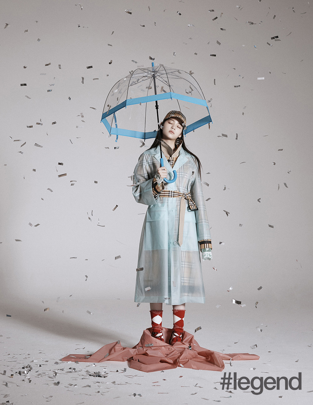 We're obsessed with Burberry's matching umbrella and trenchcoat