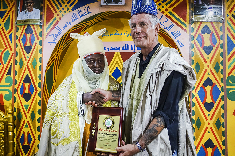 Bourdain receives a meritorious award from HRH Alhaji Musa Muhammed Dogon Kadai after filming in Lagos, Nigeria 