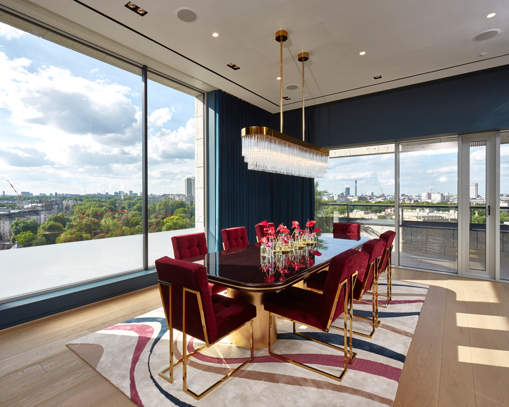 A formal dining room, with views over Victoria 